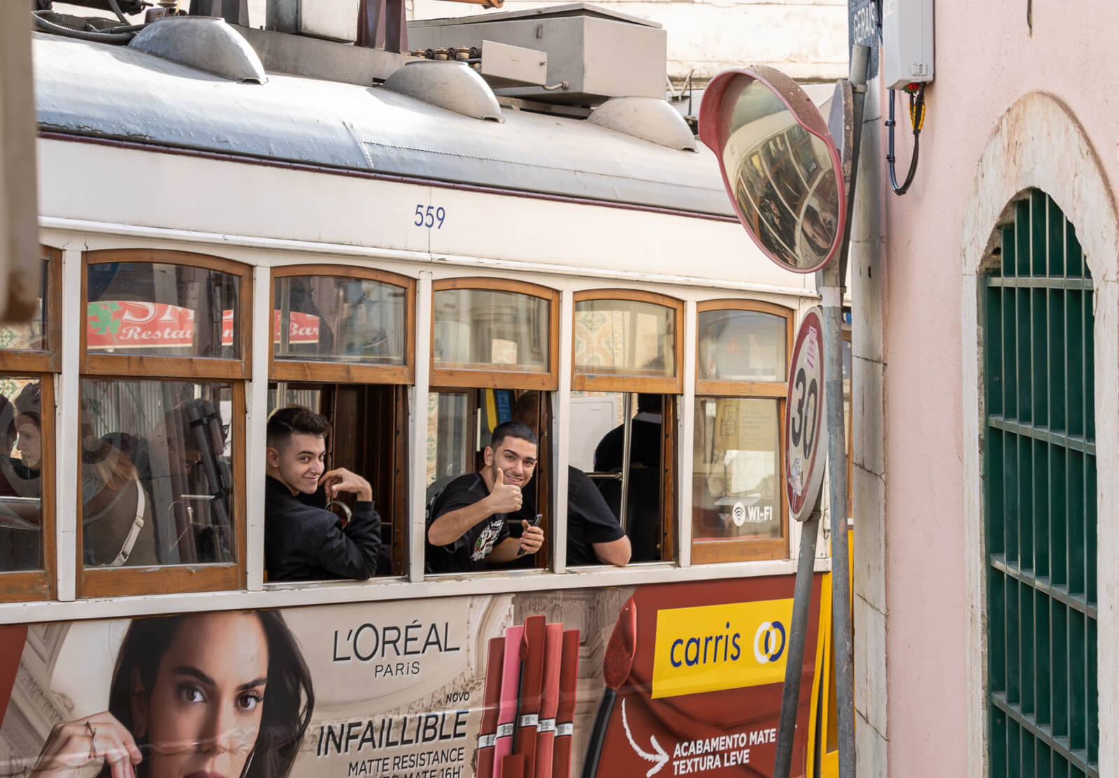 Lisbon tram with passengers